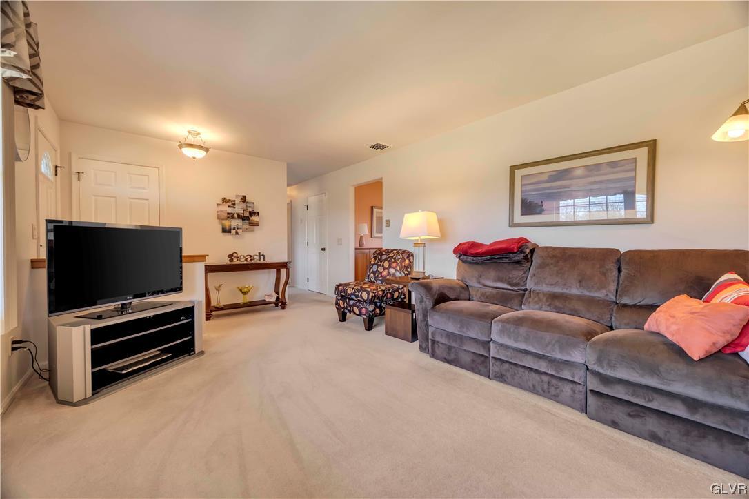 255 Filetown Road Nazareth, PA 18064 - Photo 17 of 29 a living room with furniture and a flat screen tv