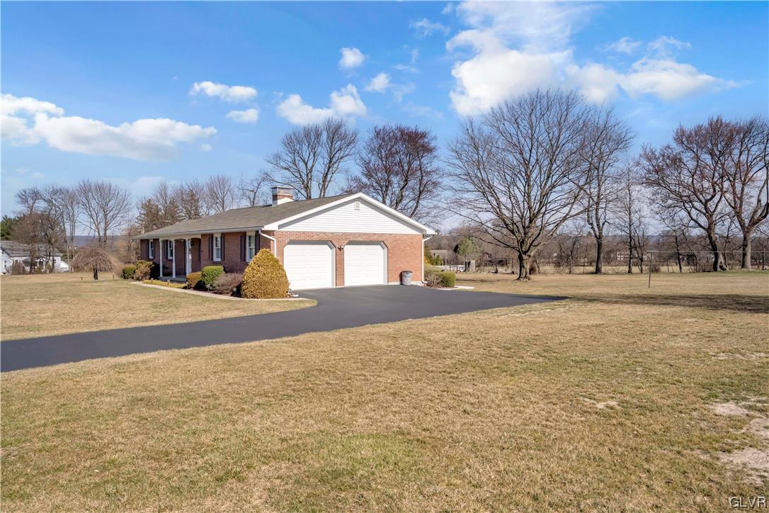 255 Filetown Road Nazareth, PA 18064 - Photo 3 of 29 a front view of a house with a yard