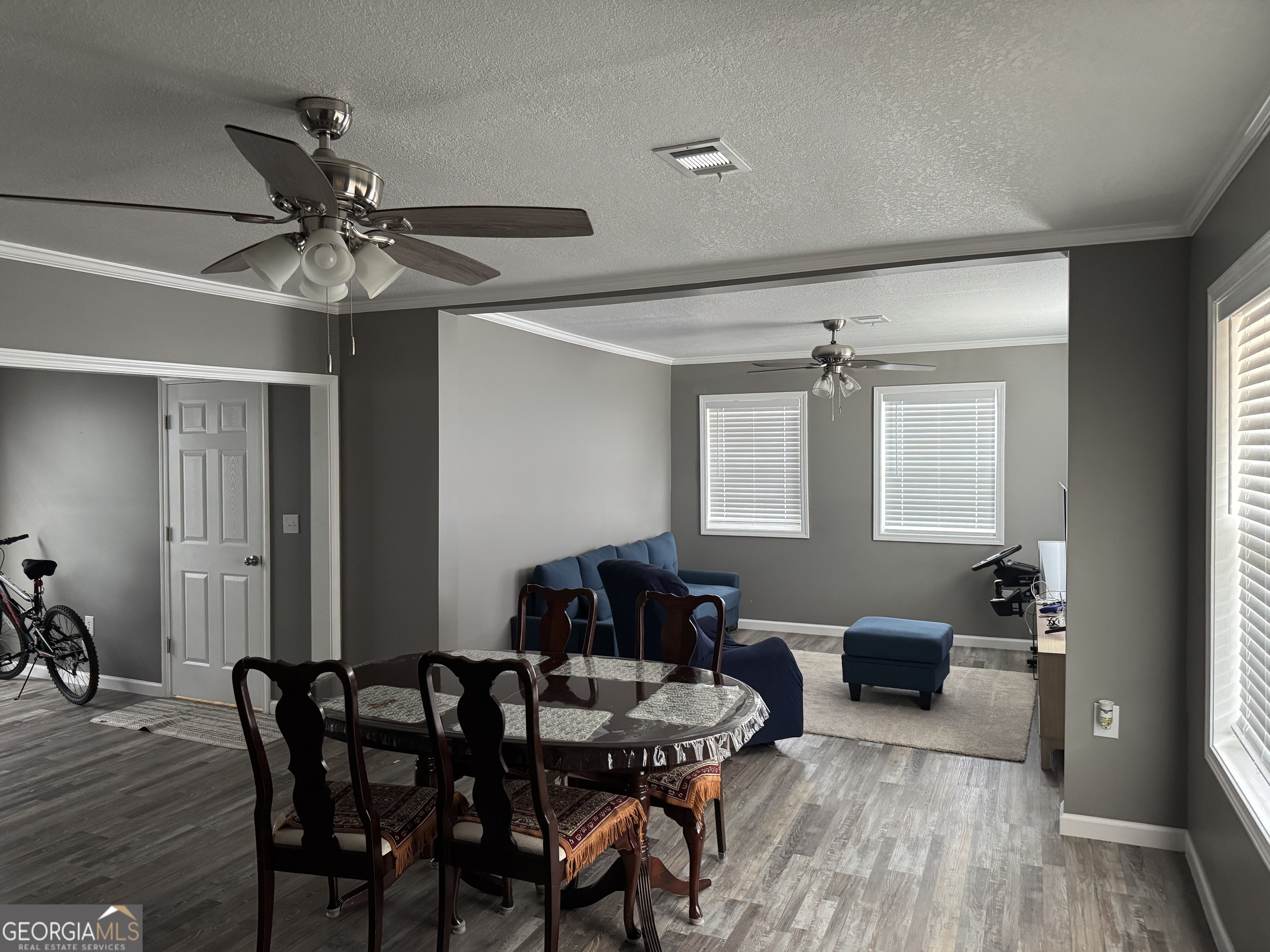10 Grove Street Hazlehurst, GA 31539 - Photo 2 of 15 a view of a livingroom and dining room