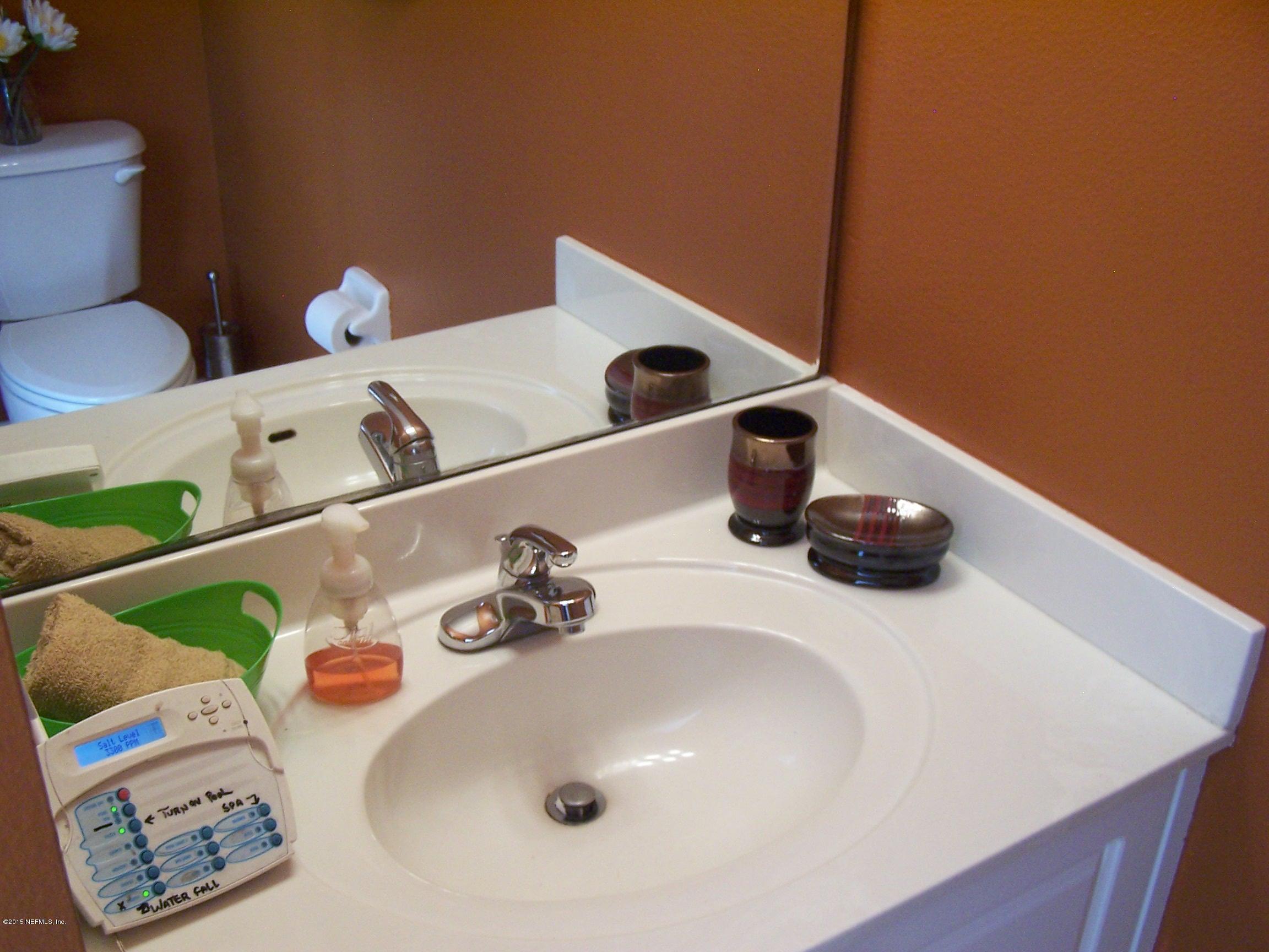 2 Reybell Lane Palm Coast, FL 32164 - Photo 36 of 43 Outdoor half bath 1