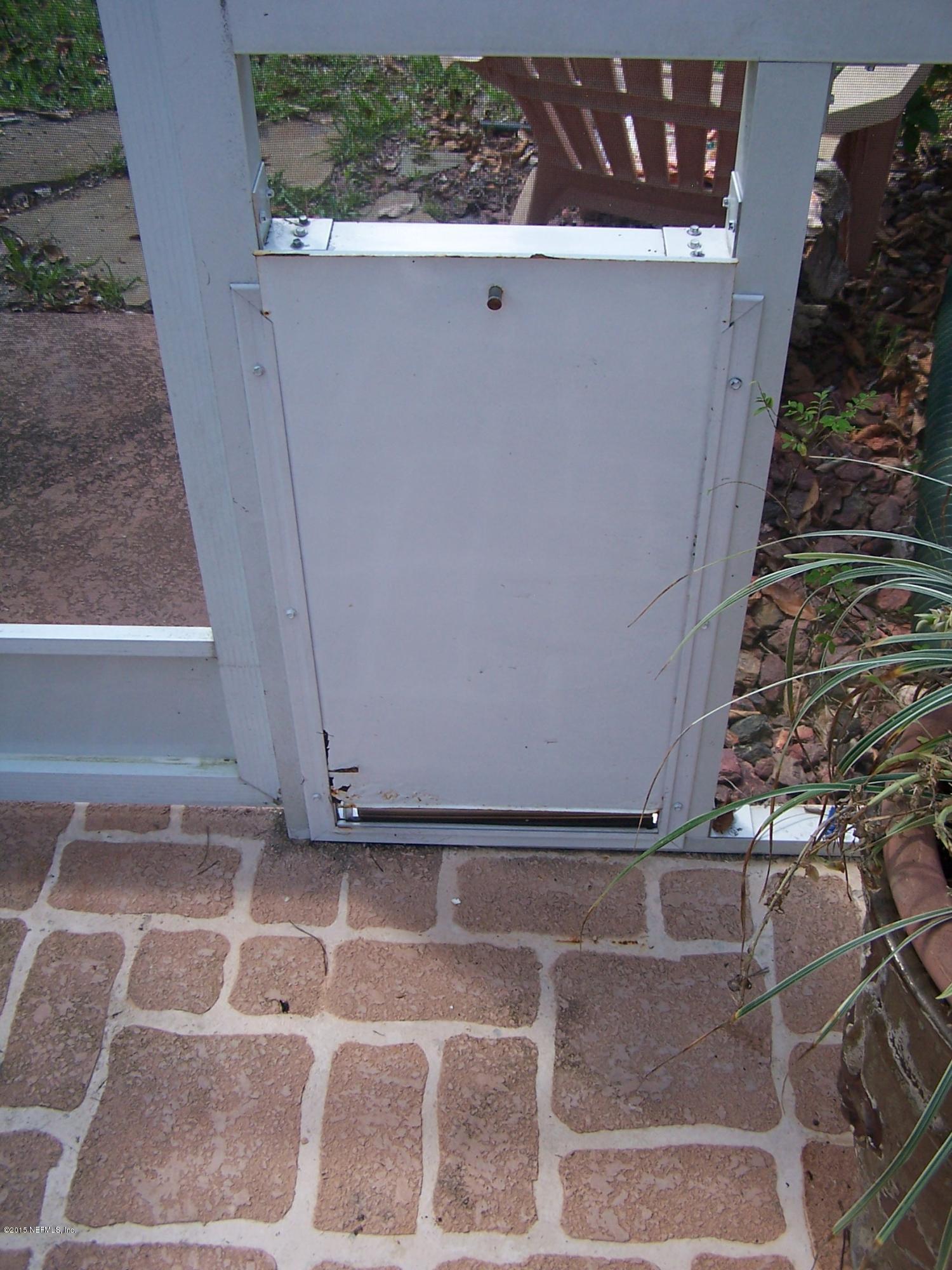 2 Reybell Lane Palm Coast, FL 32164 - Photo 38 of 43 Outdoor doggy door