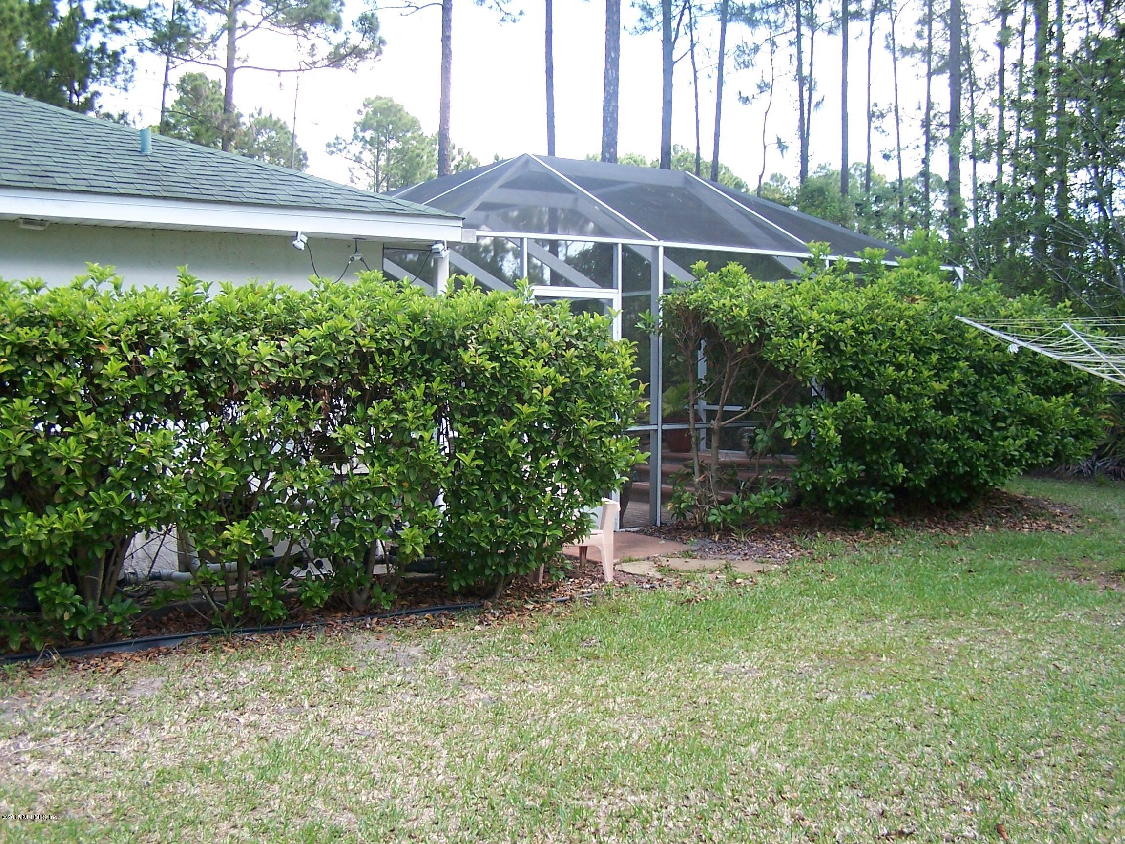 2 Reybell Lane Palm Coast, FL 32164 - Photo 39 of 43 Side yard 3
