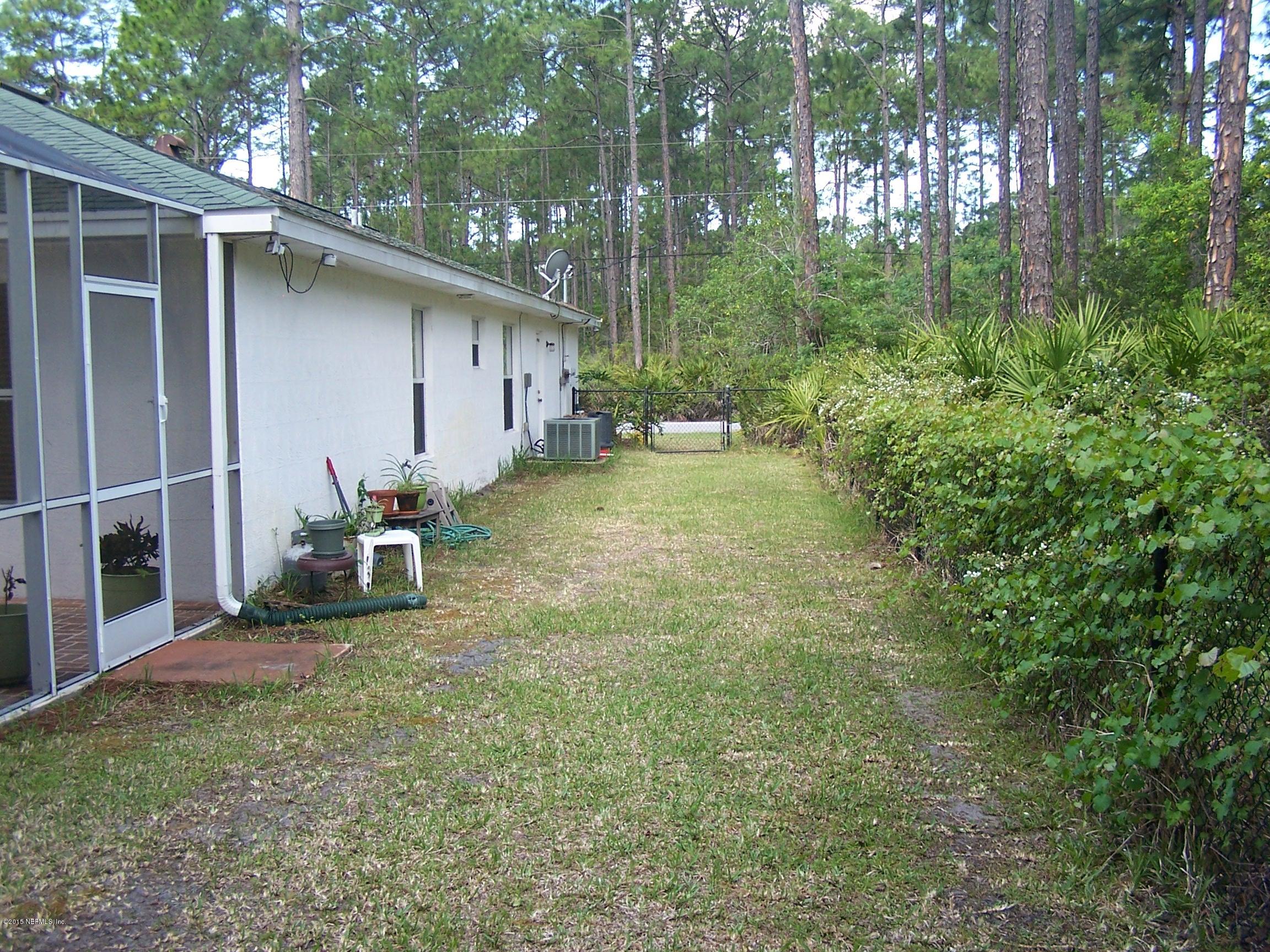 2 Reybell Lane Palm Coast, FL 32164 - Photo 40 of 43 Sideyard 1