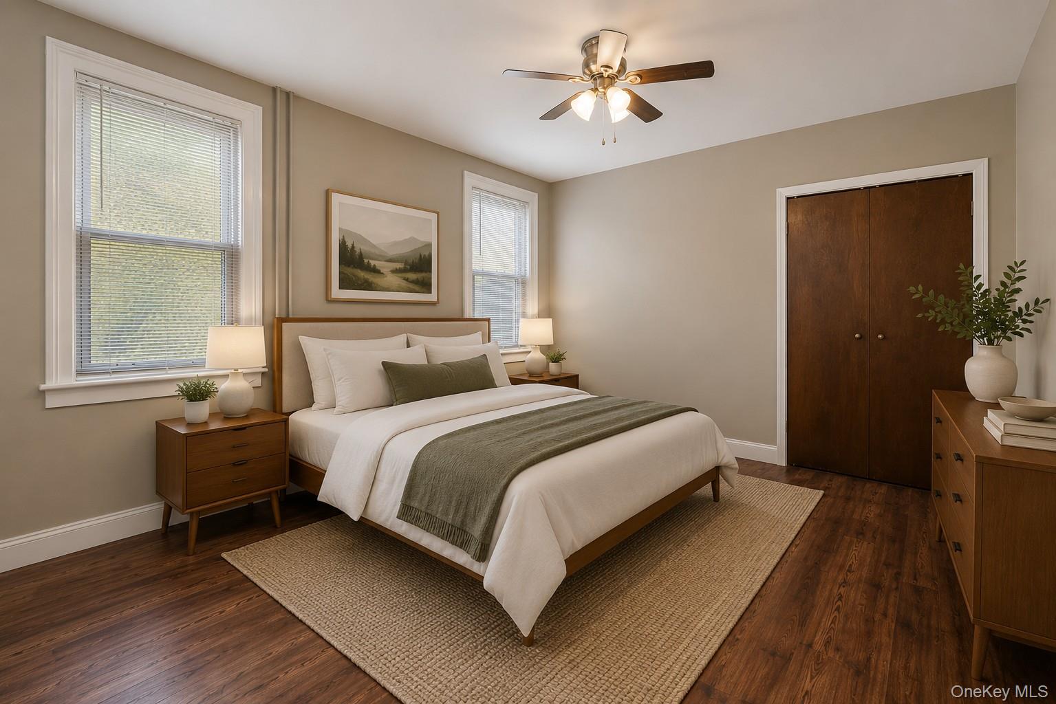 57-39 57th Road Queens, NY 11378 - Photo 3 of 31 a bedroom with a bed and a window