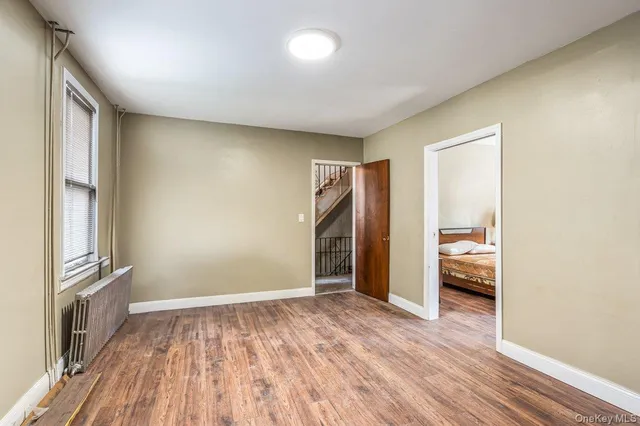 a view of an empty room and window