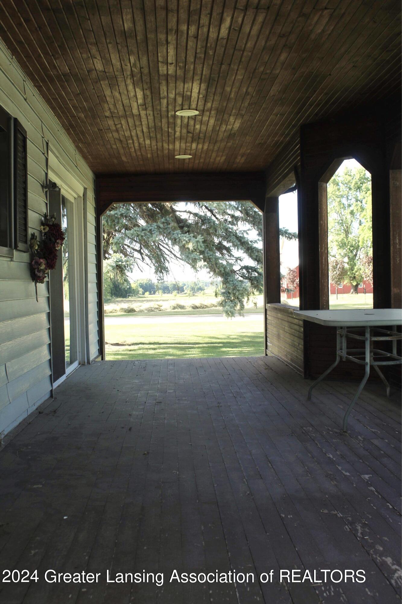 6794 East Colony Road Elsie, MI 48831 - Photo 10 of 47 Covered porch