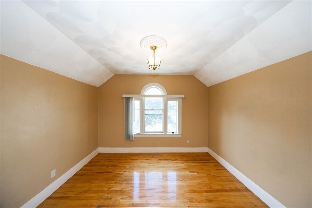 35 Tirrell Street, Unit 3 Worcester, MA 01603 - Photo 7 of 9 a view of empty room with wooden floor and fan
