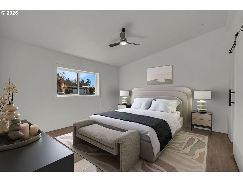 1477 June Way Woodburn, OR 97071 - Photo 19 of 34 a bedroom with a bed and window