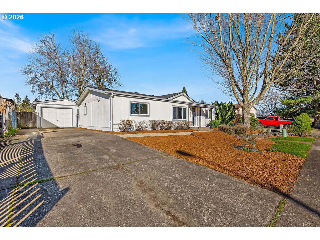 1477 June Way Woodburn, OR 97071 - Photo 5 of 34 a view of outdoor space yard and tree