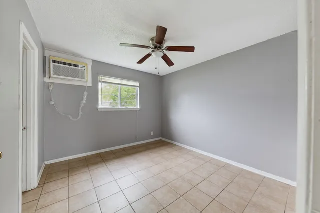 a view of an empty room and window
