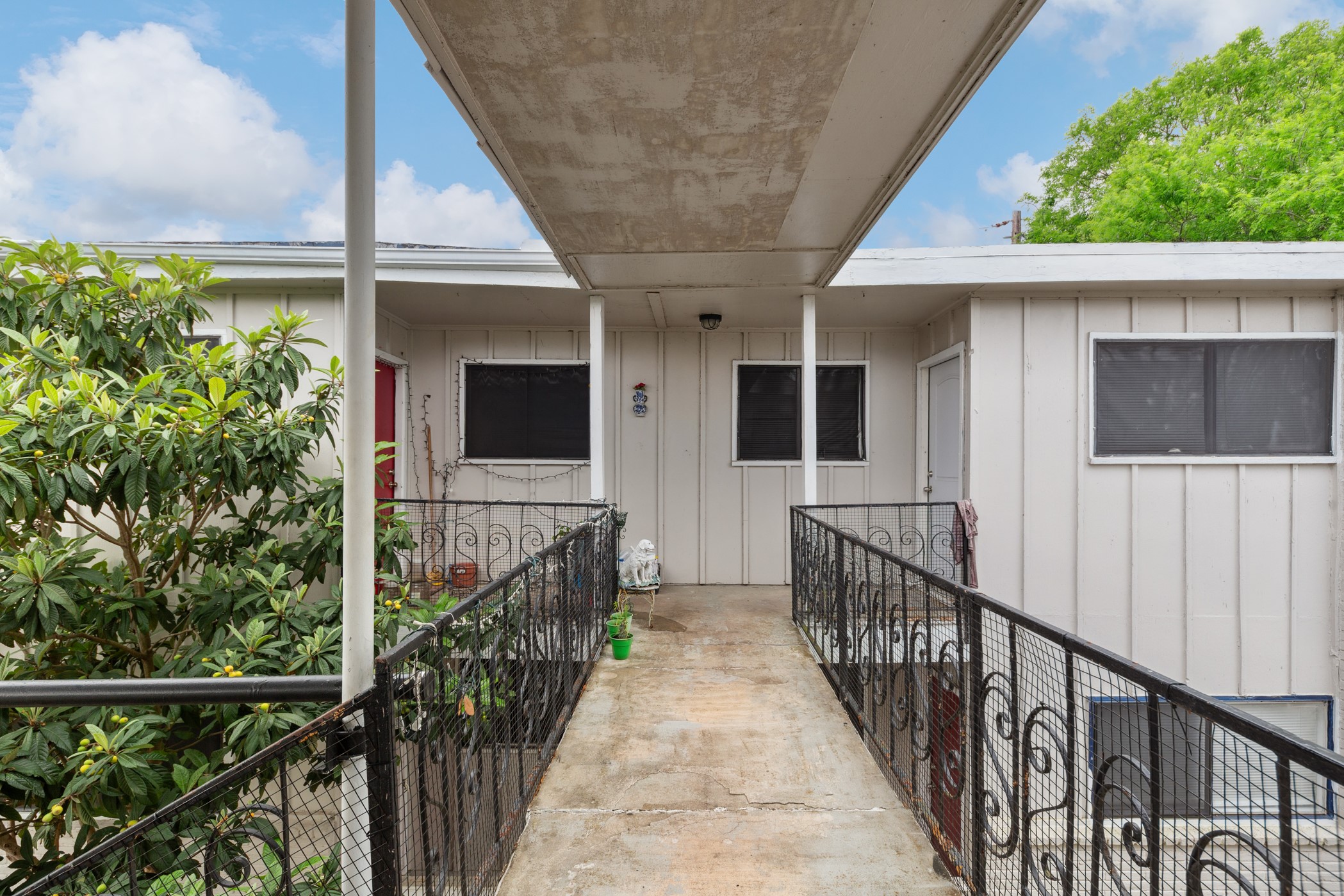 3906 Video Street, Unit F Dickinson, TX 77539 - Photo 2 of 14 a view of a house with wooden fence