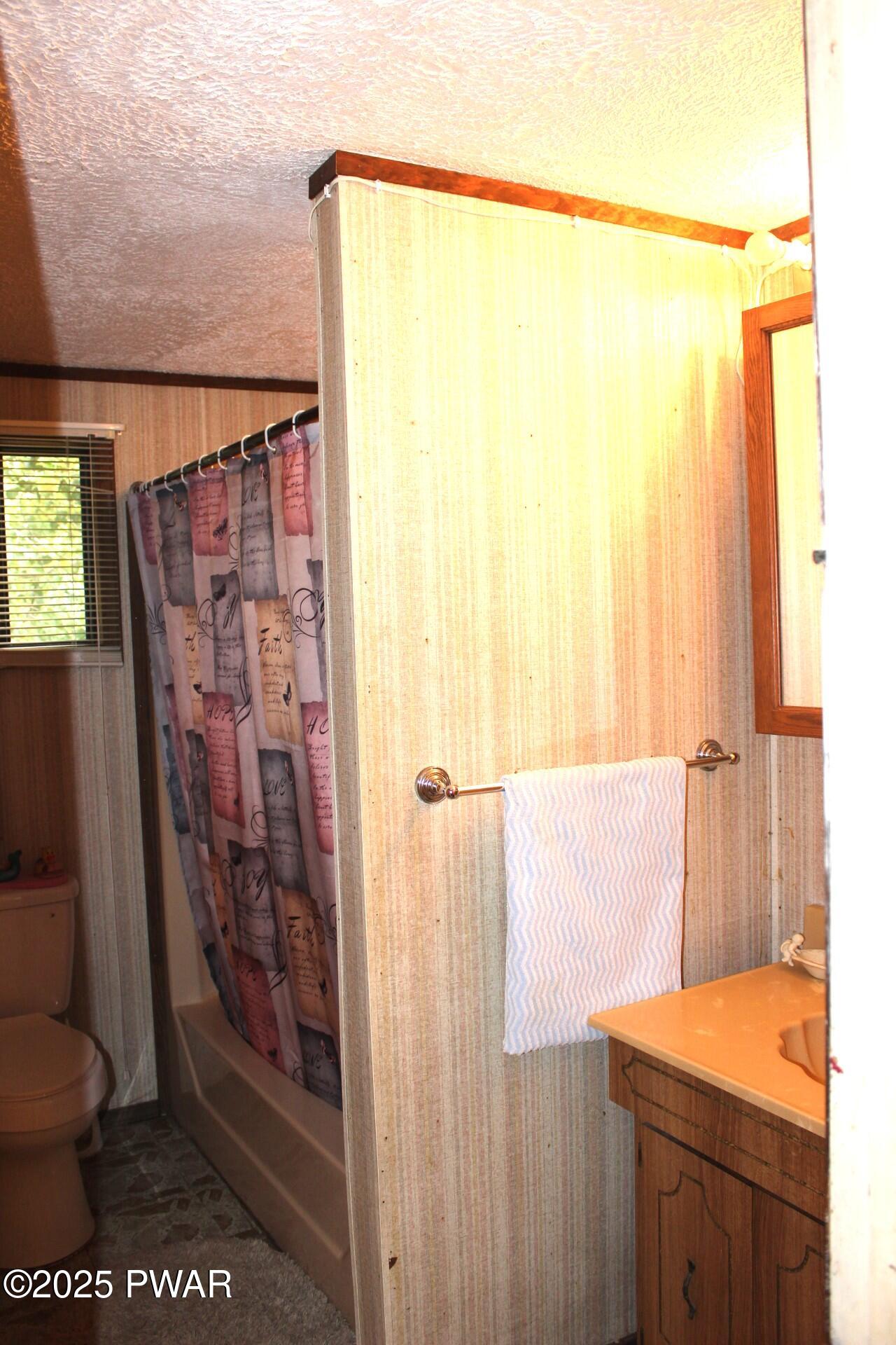 30 Brookfield Road, Unit LOT 1259 Lake Ariel, PA 18436 - Photo 8 of 32 a bathroom with a shower and a toilet
