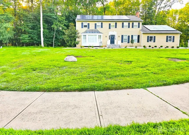 a house view with a garden space