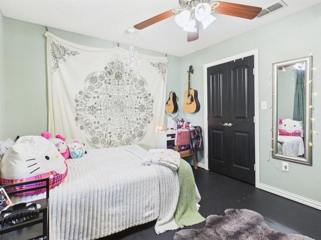 1675 Meadowview Street Athens, TX 75752 - Photo 24 of 40 a bedroom with a bed and a window