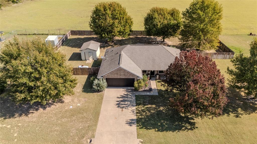 1675 Meadowview Street Athens, TX 75752 - Photo 40 of 40 a front view of a house with a yard and lake view