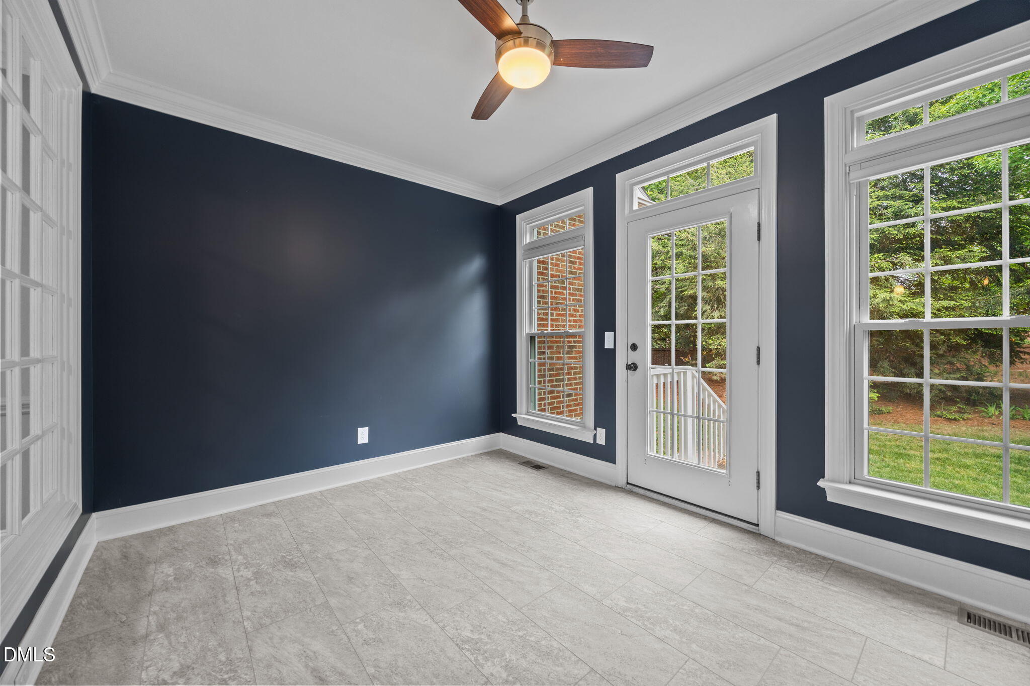3409 Sir Colleton Court Raleigh, NC 27612 - Photo 11 of 25 a view of an empty room with a window