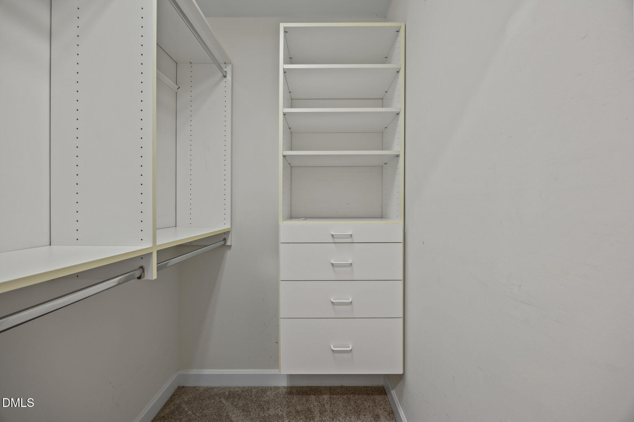 3409 Sir Colleton Court Raleigh, NC 27612 - Photo 14 of 25 a view of an empty walk in closet