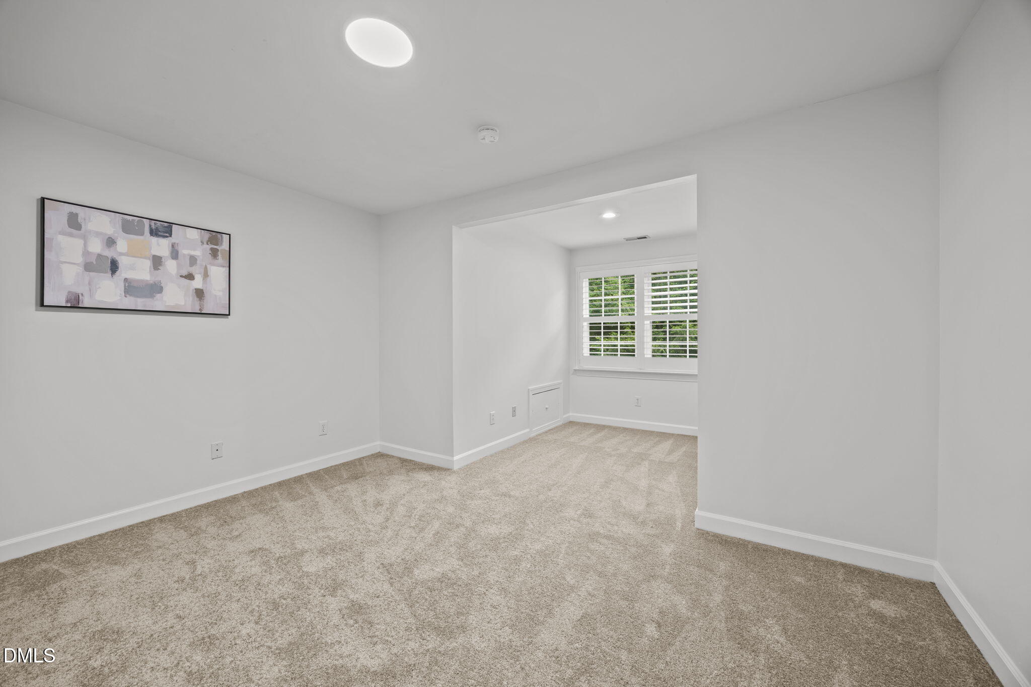 3409 Sir Colleton Court Raleigh, NC 27612 - Photo 17 of 25 an empty room with windows