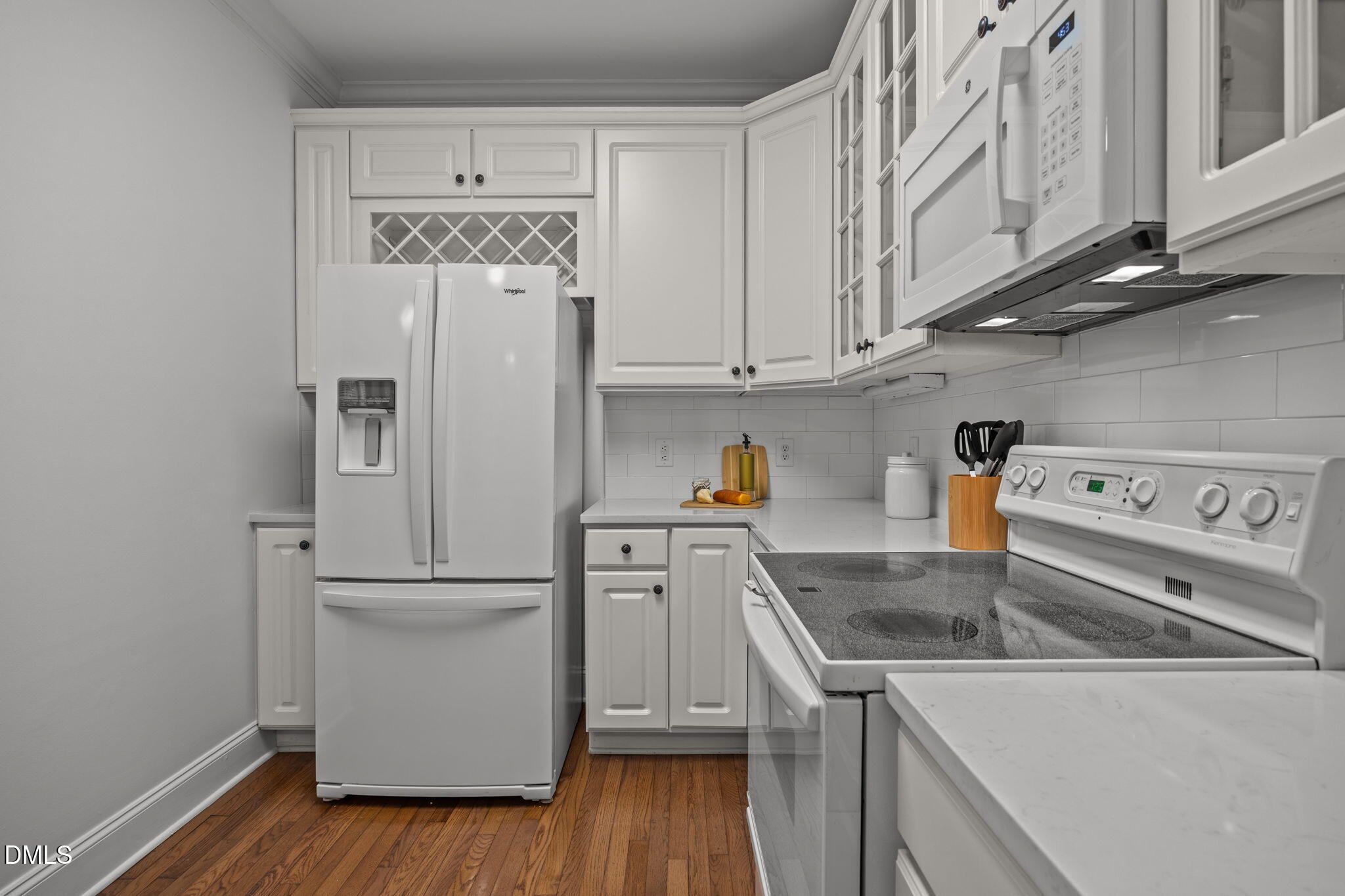 3409 Sir Colleton Court Raleigh, NC 27612 - Photo 9 of 25 a kitchen with stainless steel appliances granite countertop a refrigerator and a stove
