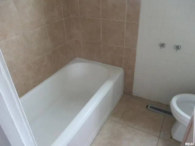 a bathroom with a bathtub
