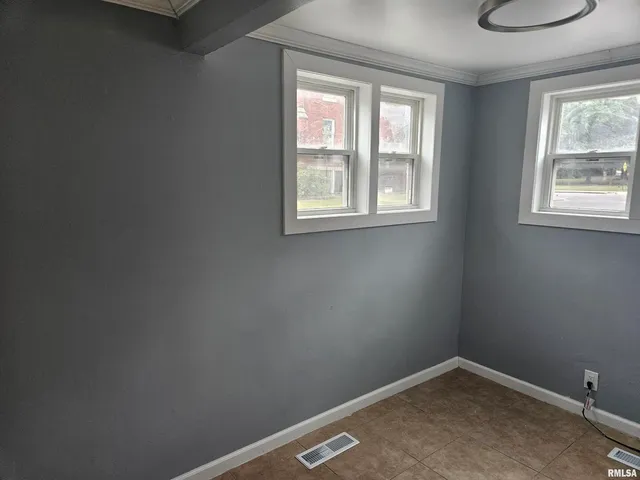an empty room with windows