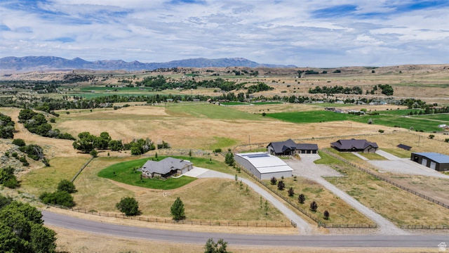 3123 East Riverdale Road Preston, ID 83263 - Photo 40 of 52 Aerial perspective showcasing multiple properties amidst expansive natural landscapes