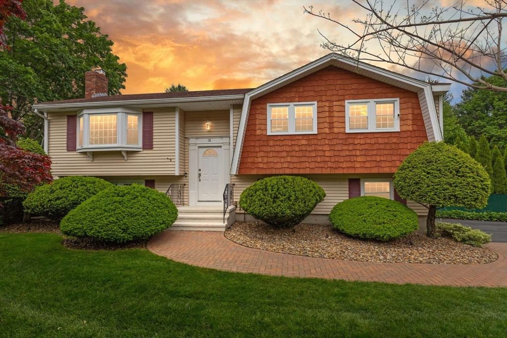 18 Winsor Road Billerica, MA 01821 - Photo 1 of 28 a front view of a house with a yard