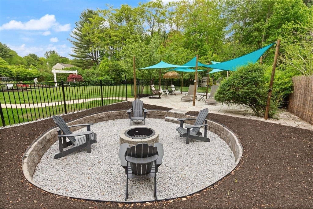 18 Winsor Road Billerica, MA 01821 - Photo 26 of 28 a view of a table and chairs in the patio