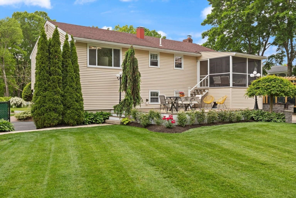 18 Winsor Road Billerica, MA 01821 - Photo 28 of 28 a front view of house with yard and green space
