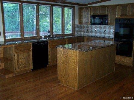 3736 Summit Ridge Drive Rochester, MI 48306 - Photo 11 of 18 kitchen island