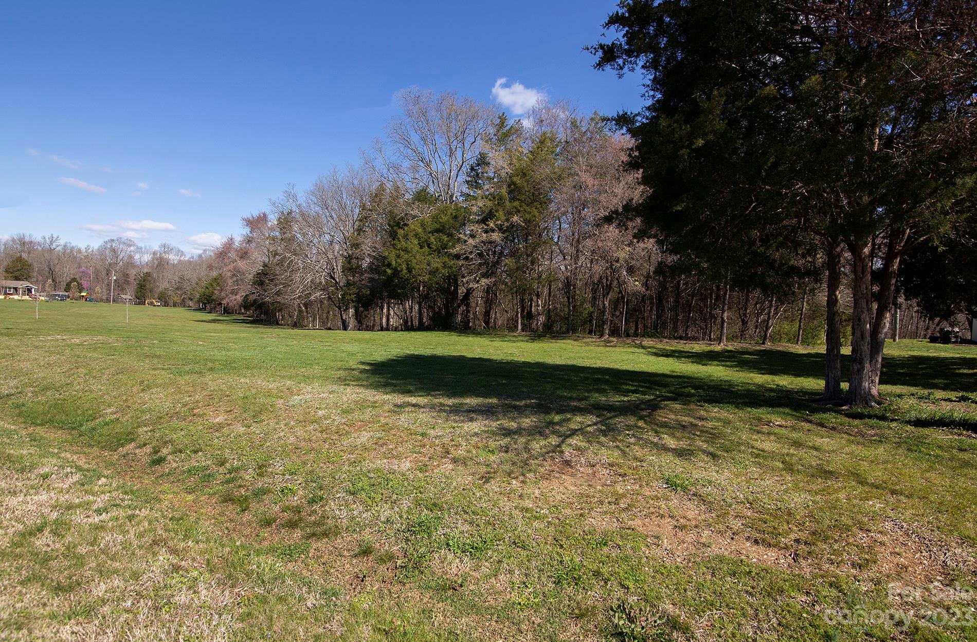 Lot 4-5850 Alexander Road Concord, NC 28027 - Photo 3 of 10 a view of a golf course