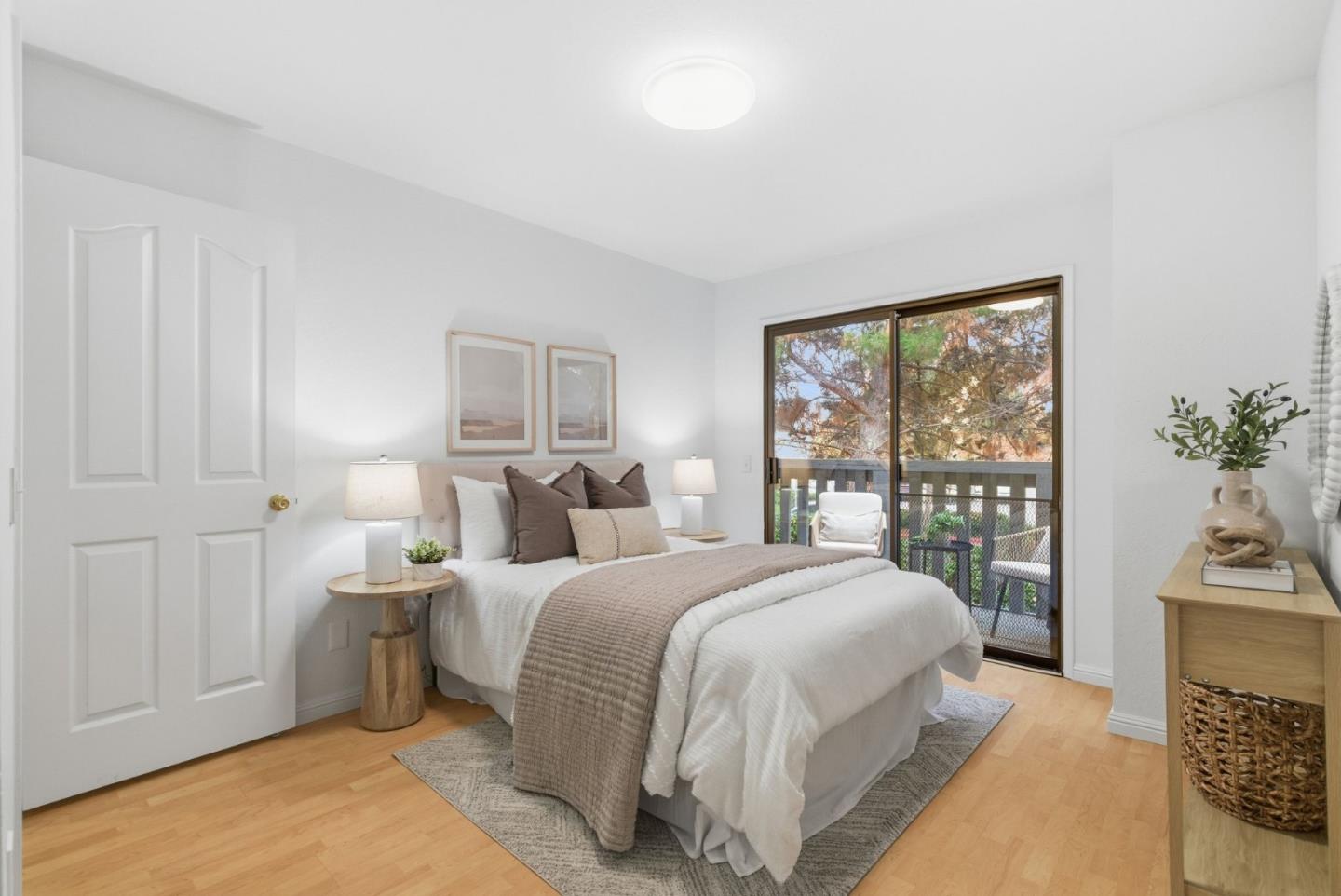 1144 Cherryview Lane San Jose, CA 95118 - Photo 28 of 77 a bedroom with a large bed and a potted plant