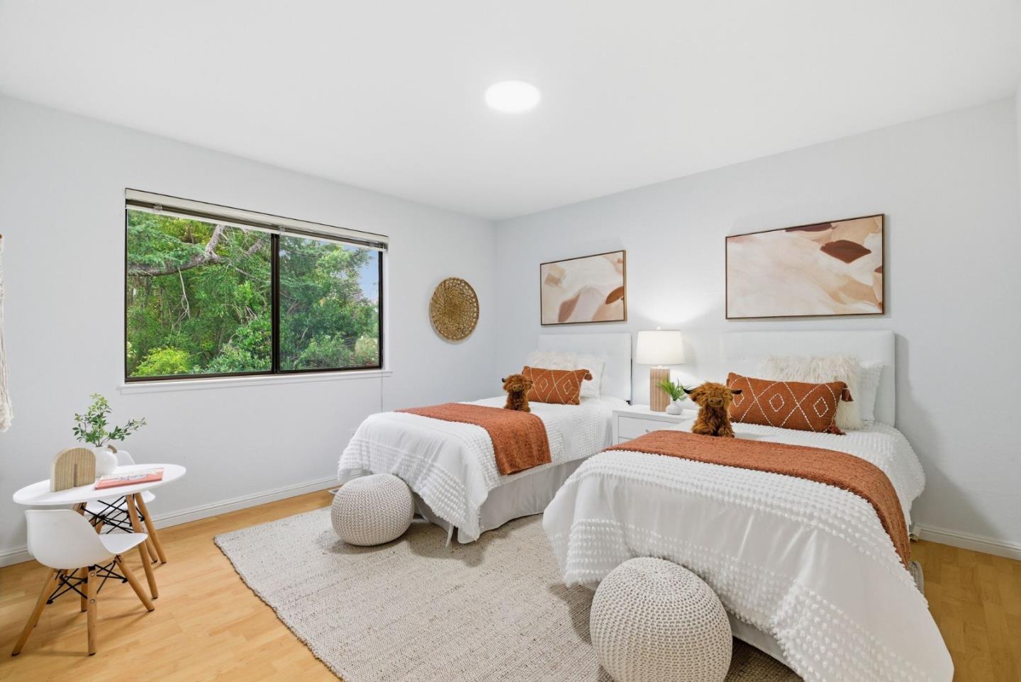 1144 Cherryview Lane San Jose, CA 95118 - Photo 31 of 77 a bedroom with two beds and a large window