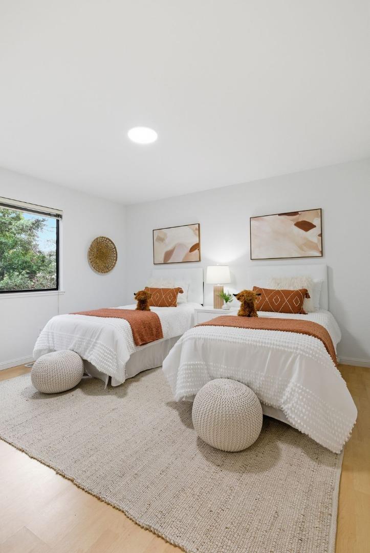 1144 Cherryview Lane San Jose, CA 95118 - Photo 32 of 77 a bedroom with two beds and a couch