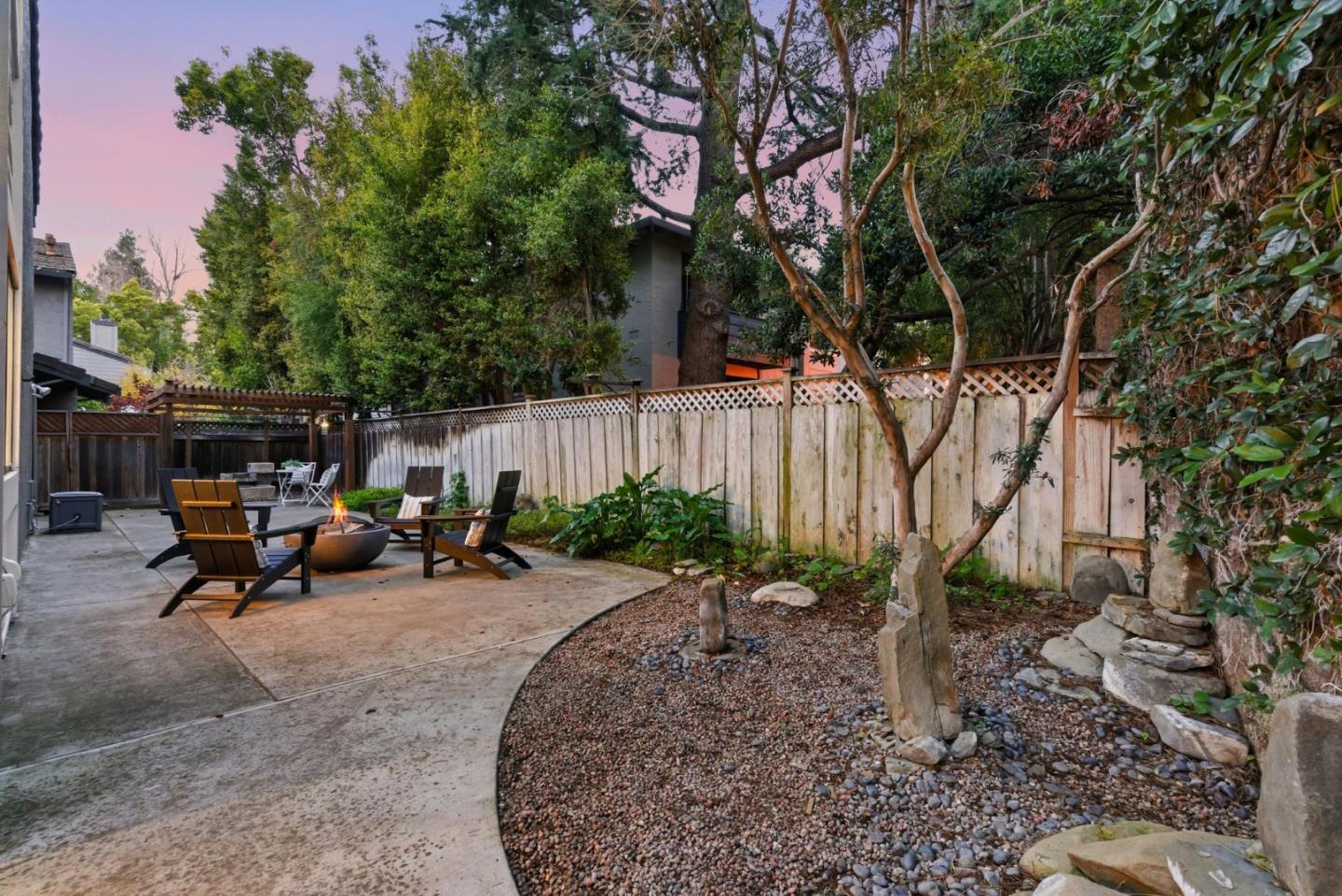 1144 Cherryview Lane San Jose, CA 95118 - Photo 44 of 77 a view of a patio with table and chairs under an umbrella