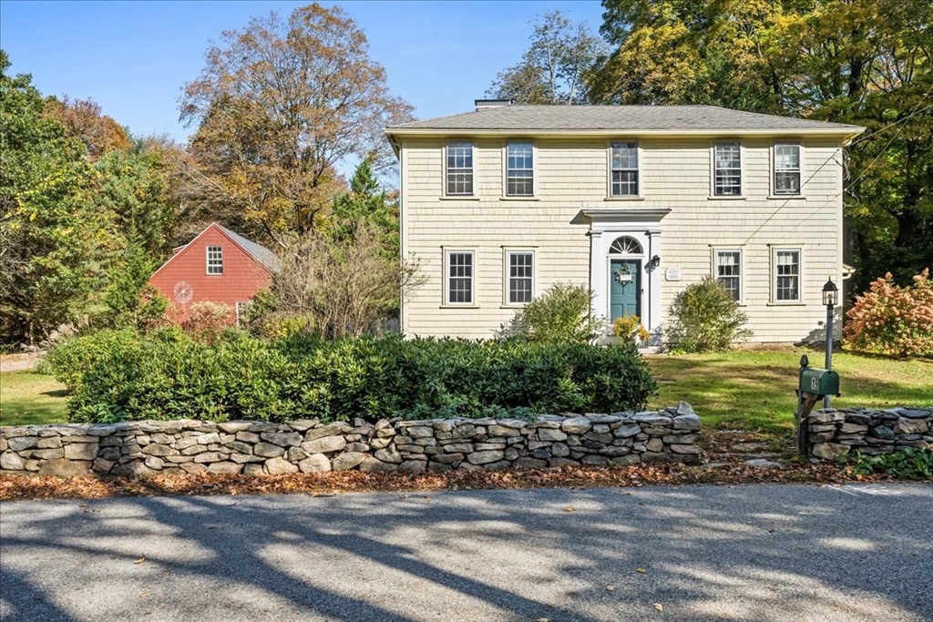 19 Gilmore Road Southborough, MA 01772 - Photo 1 of 42 a front view of house with yard and green space