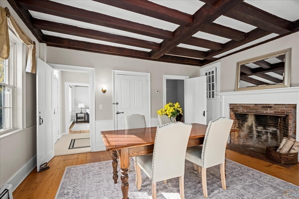 19 Gilmore Road Southborough, MA 01772 - Photo 12 of 42 a view of a dining room with furniture and wooden floor