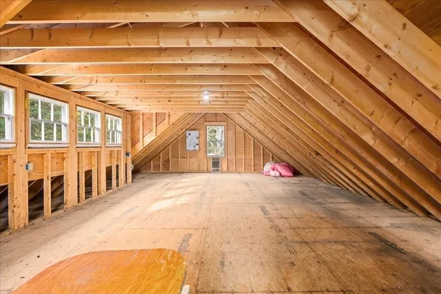 a view of a backyard with swimming pool