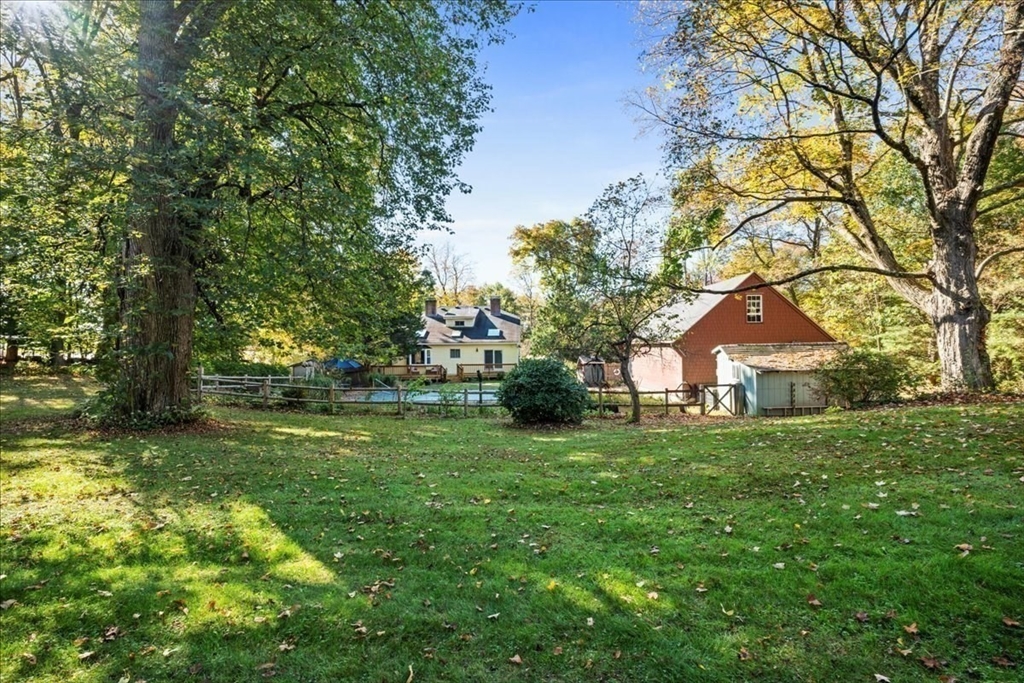 19 Gilmore Road Southborough, MA 01772 - Photo 36 of 42 a front view of a house with a yard
