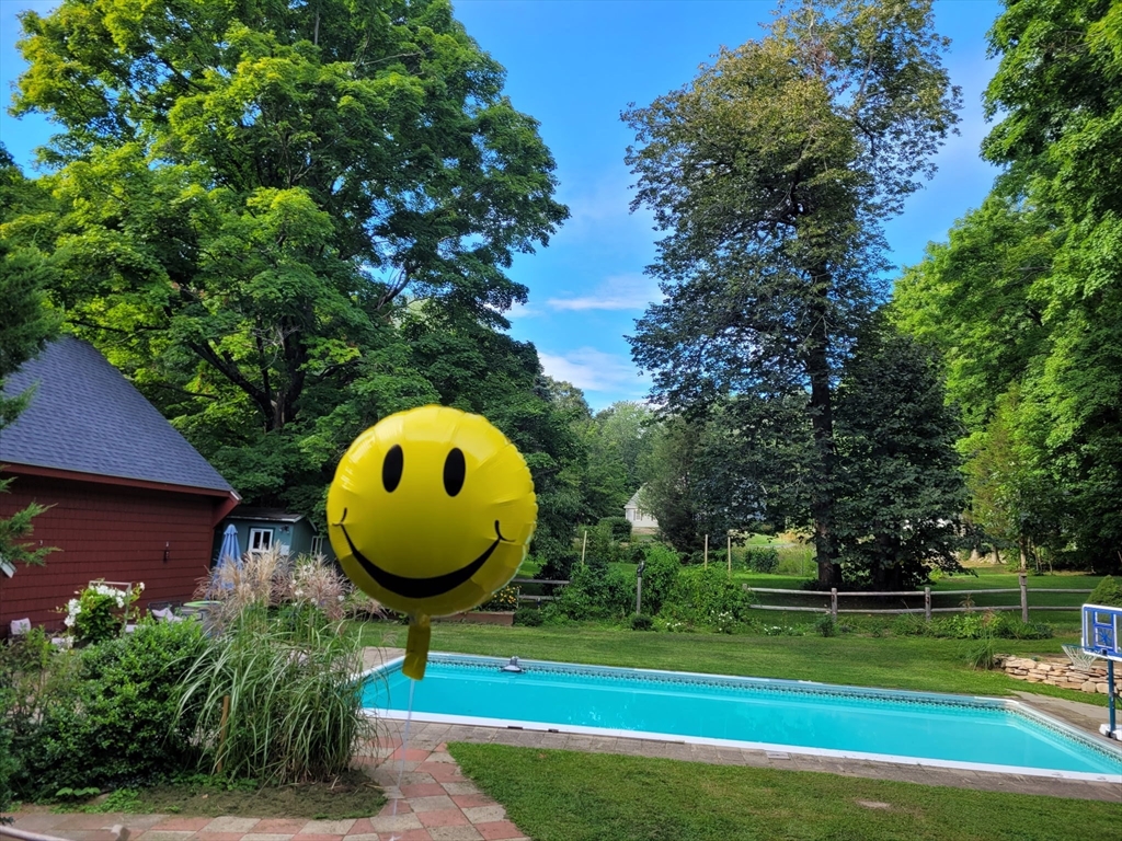 19 Gilmore Road Southborough, MA 01772 - Photo 40 of 42 a view of a golf course with a swimming pool