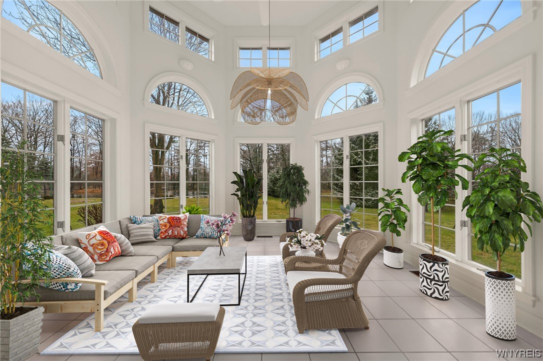 5061 Donnington Road Clarence, NY 14031 - Photo 19 of 42 Virtually staged as sunroom. There is a sink and a