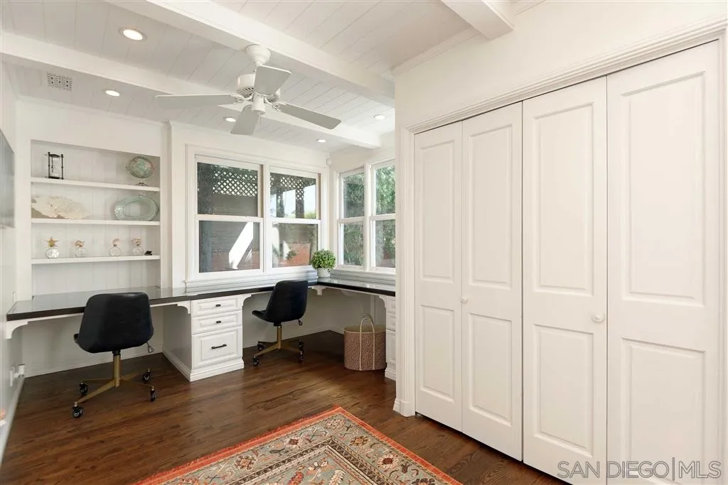 7865 El Paseo Grande La Jolla, CA 92037 - Photo 11 of 23 a view of a workspace with furniture and a window