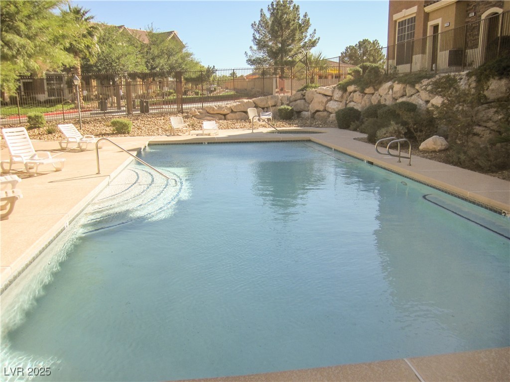 2755 Fountain Ridge Lane Henderson, NV 89074 - Photo 4 of 6 Community pool with a patio