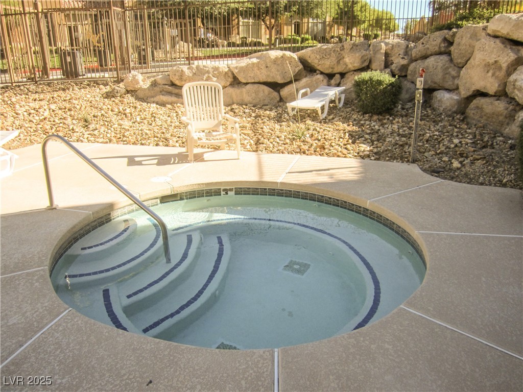 2755 Fountain Ridge Lane Henderson, NV 89074 - Photo 5 of 6 View of swimming pool with a patio and a hot tub