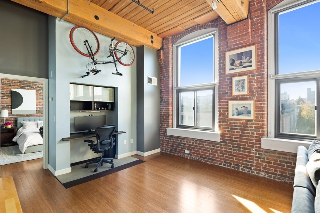 320 West 2nd Street, Unit 413 Boston, MA 02127 - Photo 7 of 20 a view of an entryway with wooden floor and a window