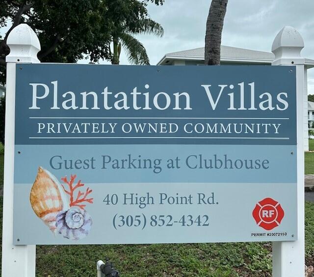 40 High Point Road, Unit D202 Tavernier, FL 33070 - Photo 1 of 28 a sign broad on the wall