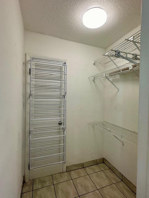40 High Point Road, Unit D202 Tavernier, FL 33070 - Photo 11 of 28 a view of storage and utility room with racks on the wall
