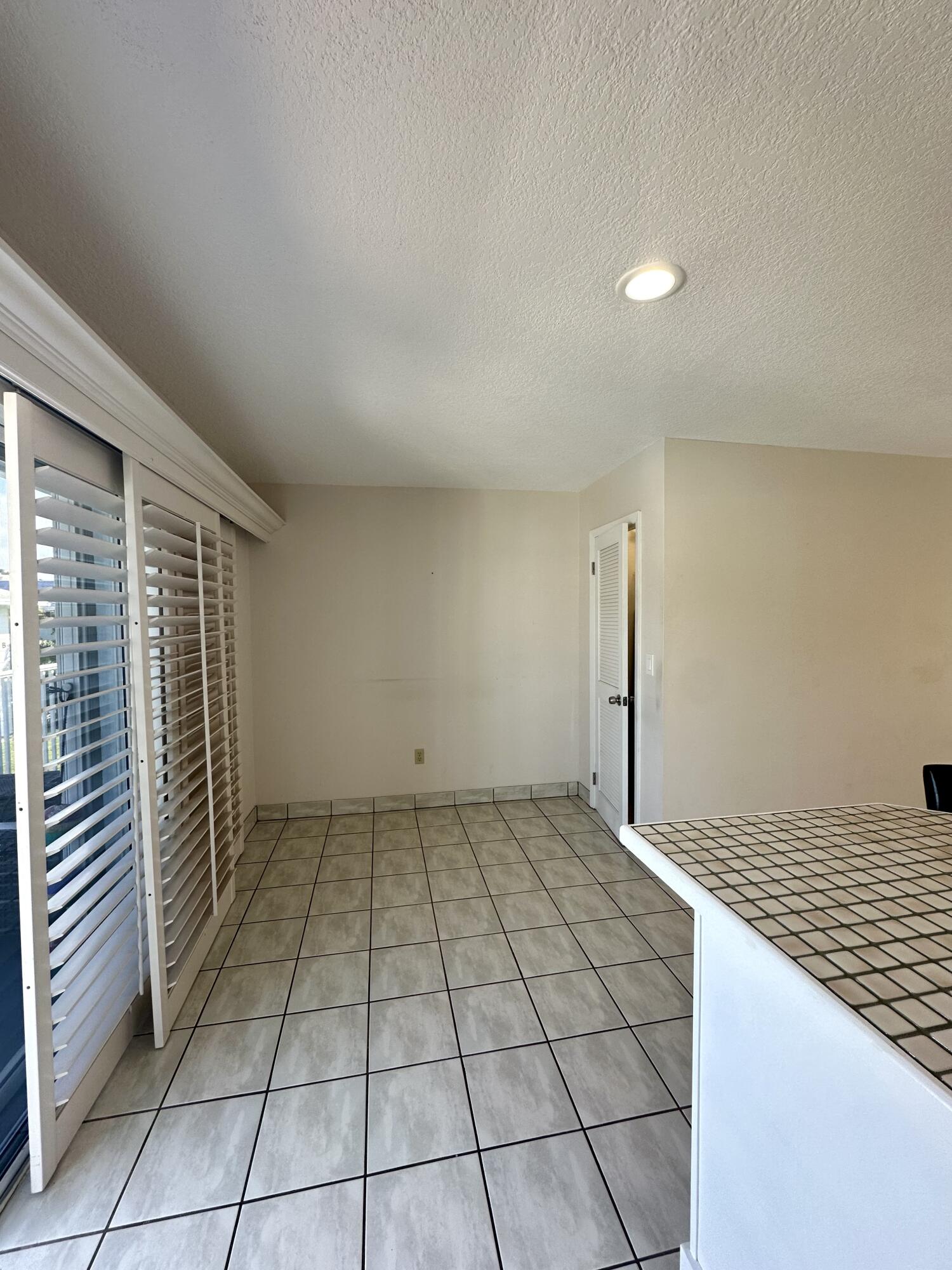 40 High Point Road, Unit D202 Tavernier, FL 33070 - Photo 14 of 28 a view of an empty room and window