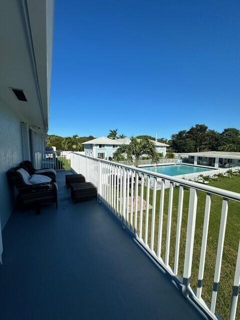 40 High Point Road, Unit D202 Tavernier, FL 33070 - Photo 23 of 28 a view of balcony with furniture