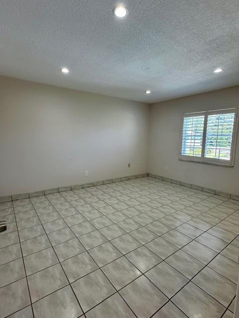 40 High Point Road, Unit D202 Tavernier, FL 33070 - Photo 8 of 28 an empty room with windows